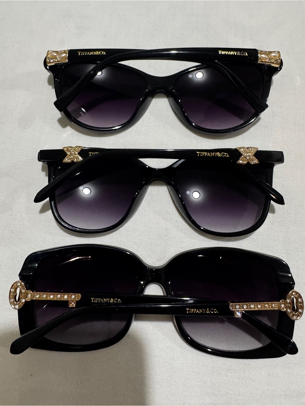 3x Tiffany & Co. Black Sunglasses with Gold Accents - Women's Collection